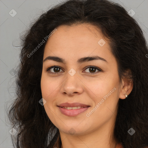 Joyful latino young-adult female with long  brown hair and brown eyes