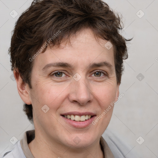 Joyful white adult female with short  brown hair and grey eyes