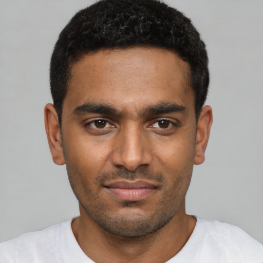 Neutral black young-adult male with short  black hair and brown eyes
