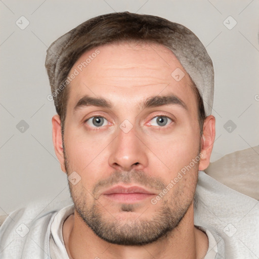 Neutral white young-adult male with short  brown hair and grey eyes