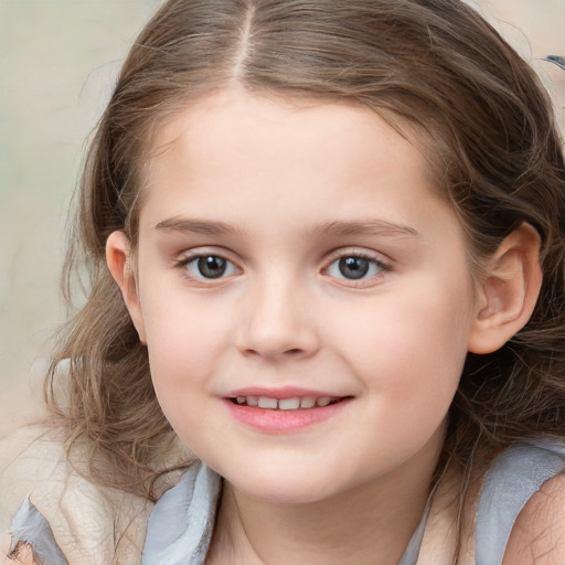 Joyful white child female with medium  brown hair and blue eyes