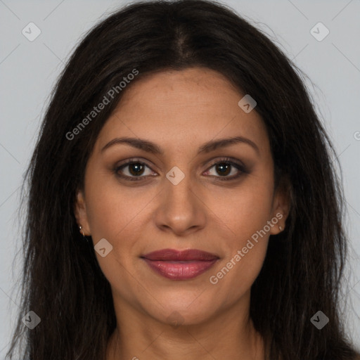 Joyful latino young-adult female with long  brown hair and brown eyes