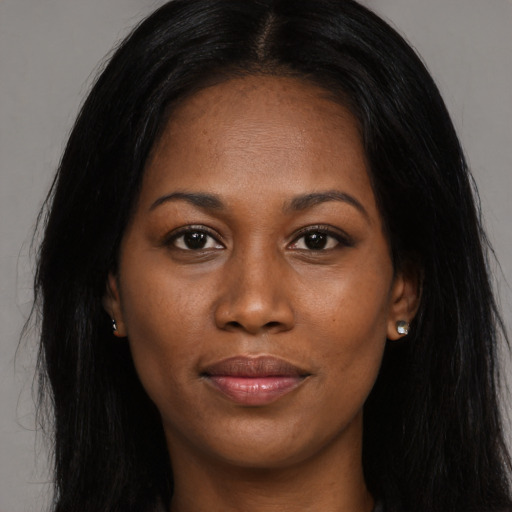 Joyful asian young-adult female with long  black hair and brown eyes