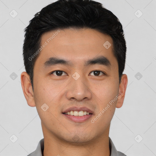 Joyful latino young-adult male with short  black hair and brown eyes