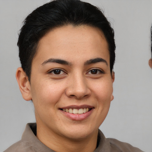 Joyful asian young-adult female with short  brown hair and brown eyes