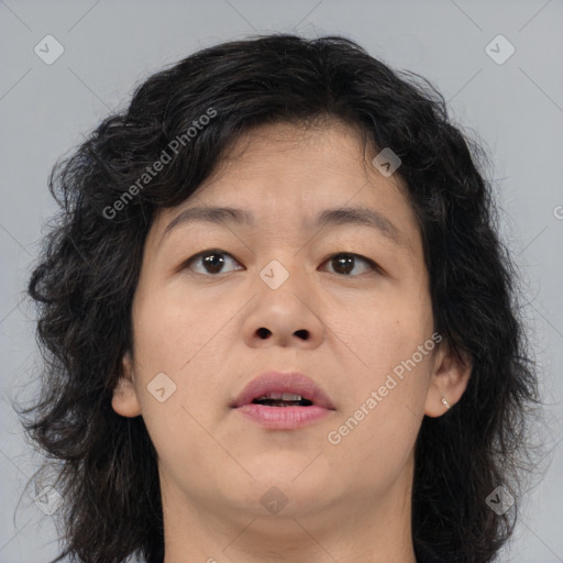 Joyful asian adult female with medium  brown hair and brown eyes