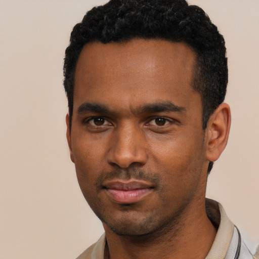 Neutral black young-adult male with short  black hair and brown eyes
