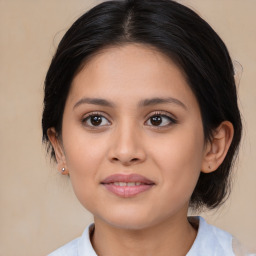 Joyful white young-adult female with medium  brown hair and brown eyes