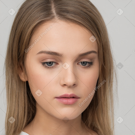 Neutral white young-adult female with long  brown hair and brown eyes