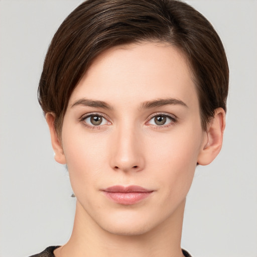 Neutral white young-adult female with short  brown hair and brown eyes