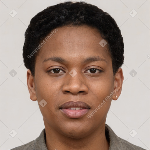 Joyful black young-adult female with short  black hair and brown eyes