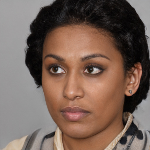 Neutral latino young-adult female with short  brown hair and brown eyes