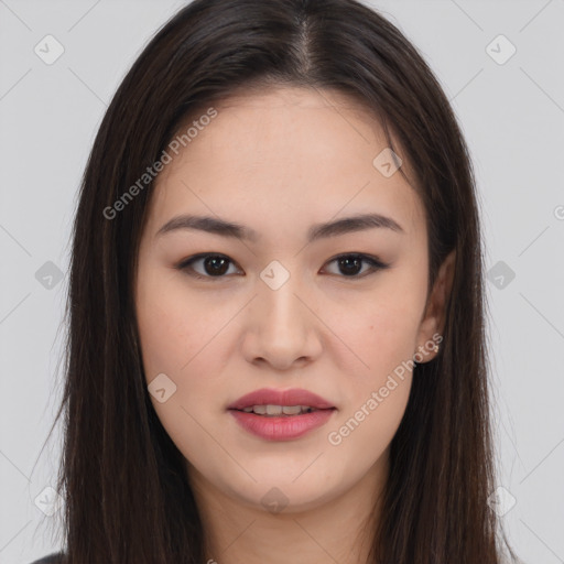 Joyful asian young-adult female with long  brown hair and brown eyes