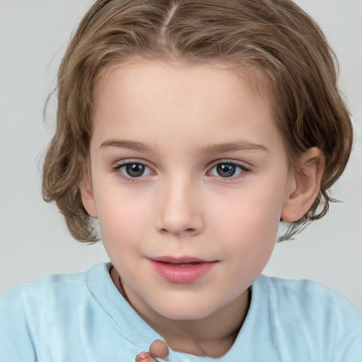 Joyful white child female with medium  brown hair and grey eyes