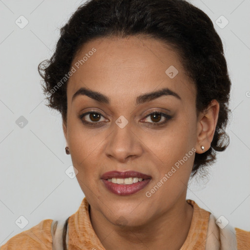 Joyful black young-adult female with short  brown hair and brown eyes