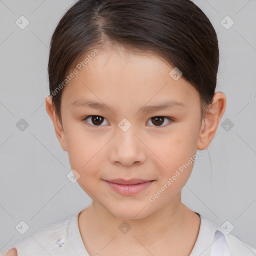 Joyful white child female with short  brown hair and brown eyes