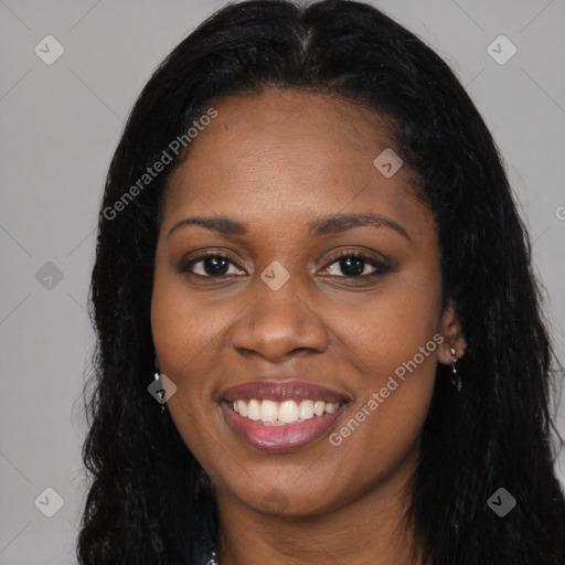 Joyful latino young-adult female with long  black hair and brown eyes