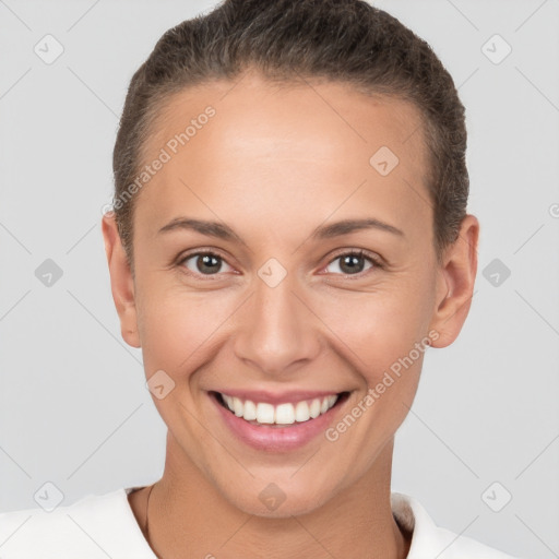 Joyful white young-adult female with short  brown hair and brown eyes