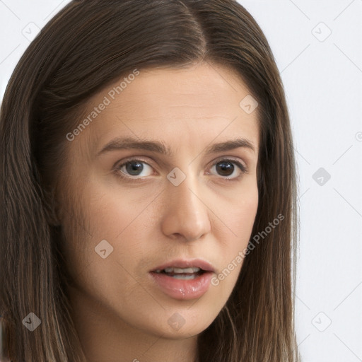 Neutral white young-adult female with long  brown hair and brown eyes