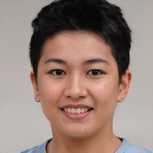 Joyful asian young-adult female with short  brown hair and brown eyes