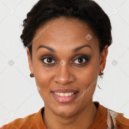 Joyful black young-adult female with short  brown hair and brown eyes