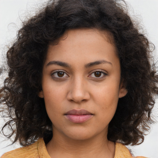Neutral latino young-adult female with long  brown hair and brown eyes