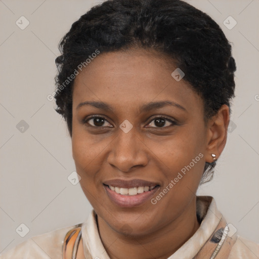 Joyful latino young-adult female with short  black hair and brown eyes