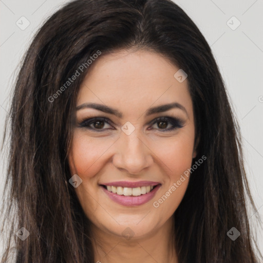 Joyful white young-adult female with long  brown hair and brown eyes