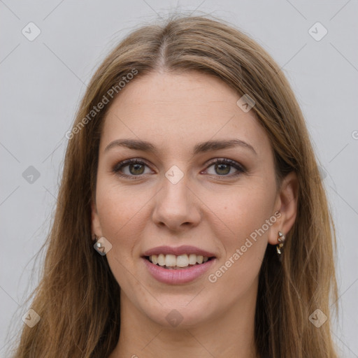 Joyful white young-adult female with long  brown hair and grey eyes