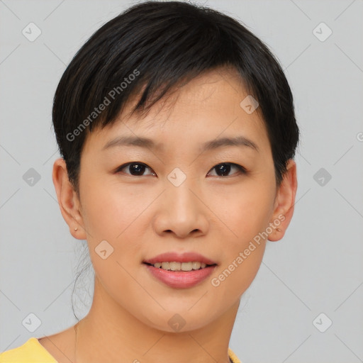 Joyful asian young-adult female with short  brown hair and brown eyes