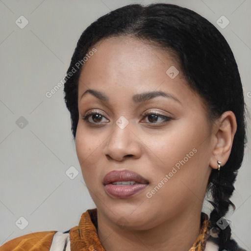 Joyful black young-adult female with medium  brown hair and brown eyes