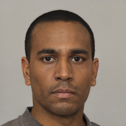 Neutral black young-adult male with short  black hair and brown eyes