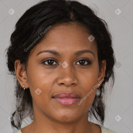 Joyful black young-adult female with medium  brown hair and brown eyes