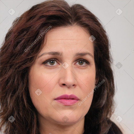 Joyful white young-adult female with medium  brown hair and green eyes