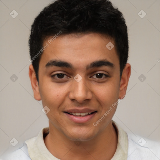 Joyful latino young-adult male with short  brown hair and brown eyes