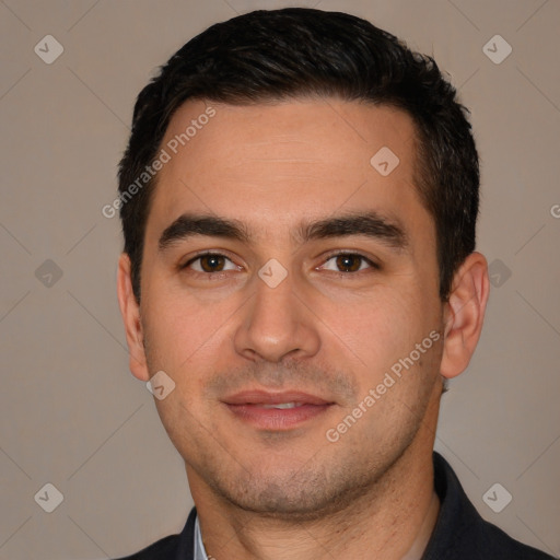 Joyful white young-adult male with short  black hair and brown eyes