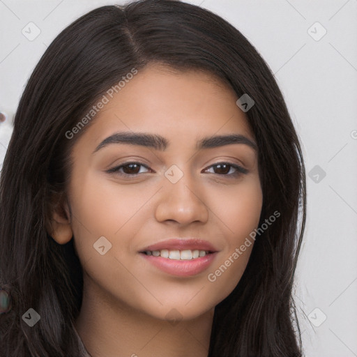 Joyful latino young-adult female with long  brown hair and brown eyes