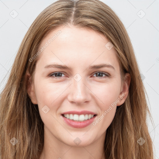 Joyful white young-adult female with long  brown hair and grey eyes