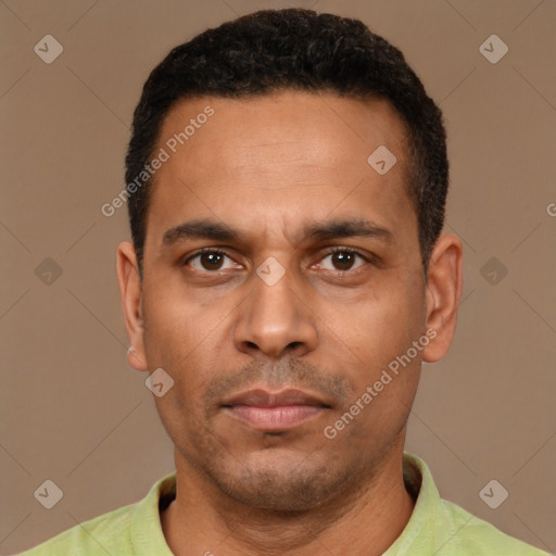 Neutral latino adult male with short  black hair and brown eyes