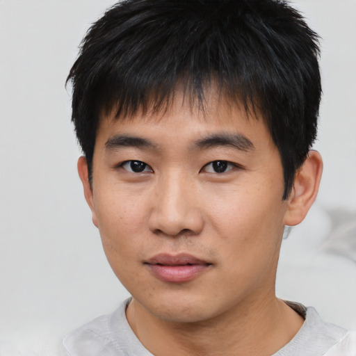 Neutral asian young-adult male with short  black hair and brown eyes