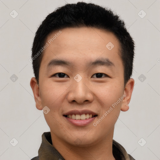 Joyful white young-adult male with short  black hair and brown eyes