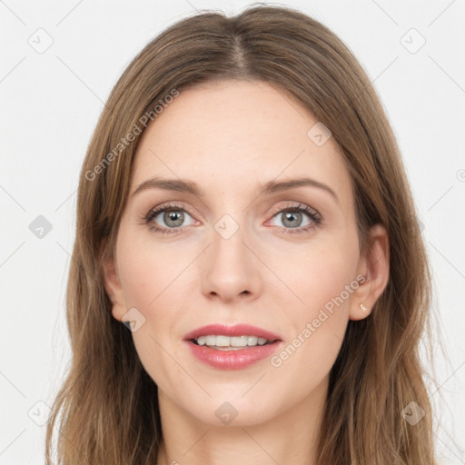 Joyful white young-adult female with long  brown hair and green eyes