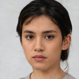 Neutral white young-adult female with medium  brown hair and brown eyes