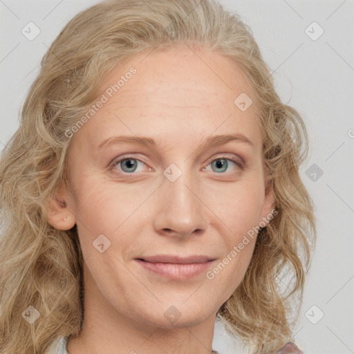 Joyful white young-adult female with medium  brown hair and blue eyes