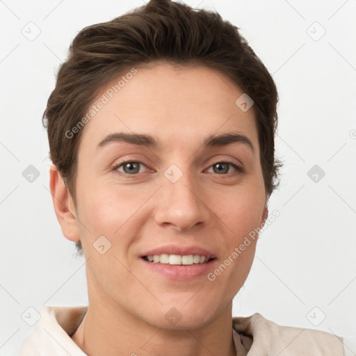 Joyful white young-adult female with short  brown hair and grey eyes