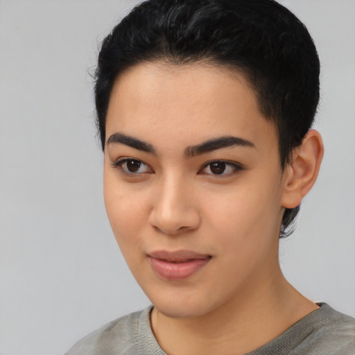 Joyful asian young-adult female with short  black hair and brown eyes