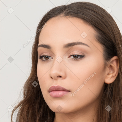 Neutral white young-adult female with long  brown hair and brown eyes