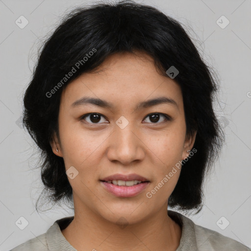 Joyful asian young-adult female with medium  black hair and brown eyes