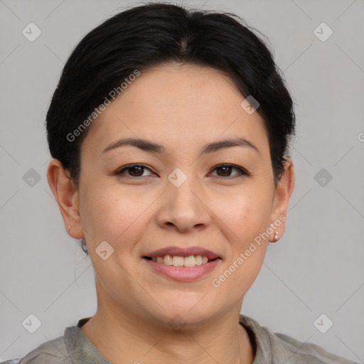 Joyful asian young-adult female with short  brown hair and brown eyes