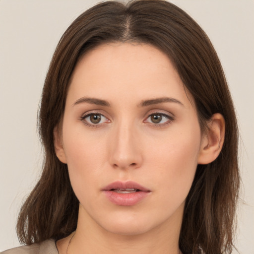 Neutral white young-adult female with medium  brown hair and brown eyes